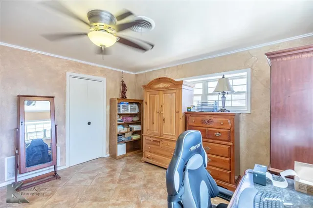 a view of a workspace with furniture