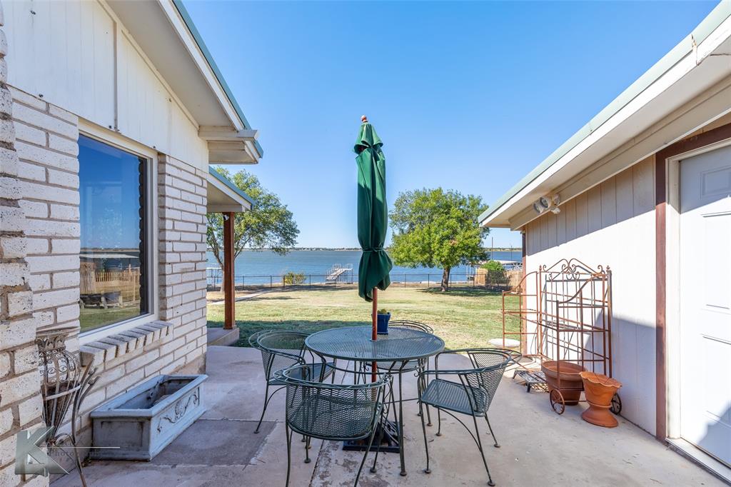 48 Poverty Point Circle Abilene, TX 79601 - Photo 21 of 35 a view of a patio with a table and chairs