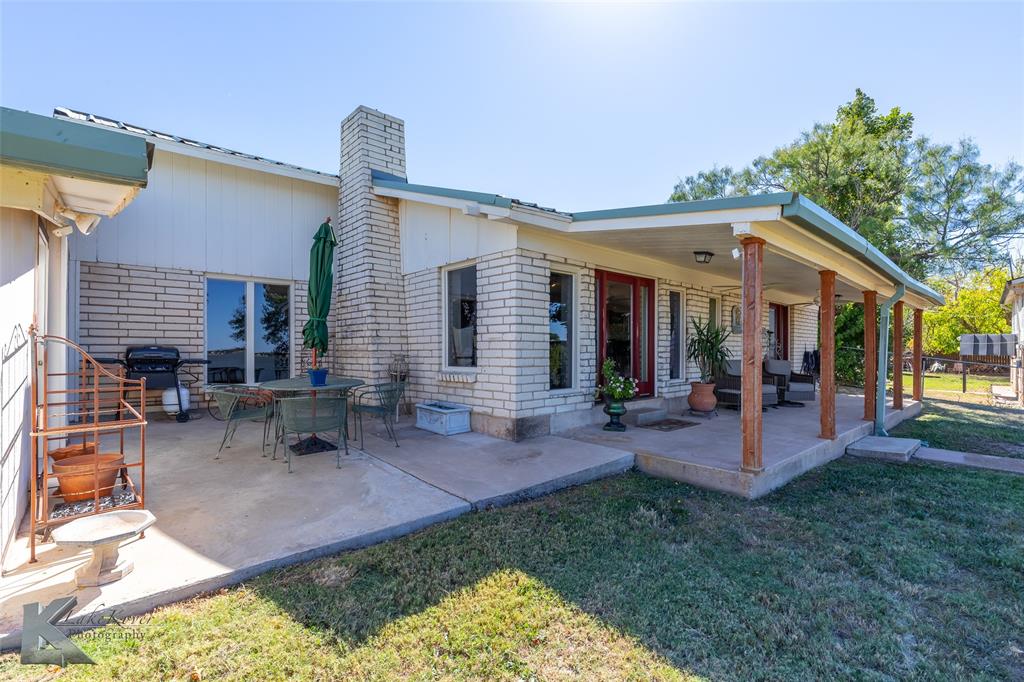 48 Poverty Point Circle Abilene, TX 79601 - Photo 22 of 35 a view of a house with a patio and a garden