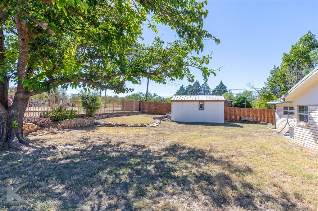 48 Poverty Point Circle Abilene, TX 79601 - Photo 27 of 35 a house view with a garden space