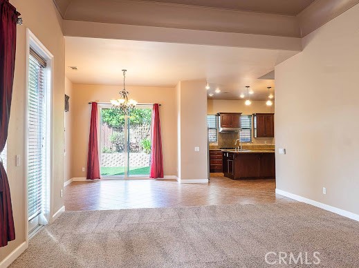 549 Palomar Circle Lompoc, CA 93436 - Photo 14 of 58 a view of a kitchen with refrigerator and a sink