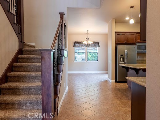 549 Palomar Circle Lompoc, CA 93436 - Photo 15 of 58 a view of hallway with stairs and wooden floor