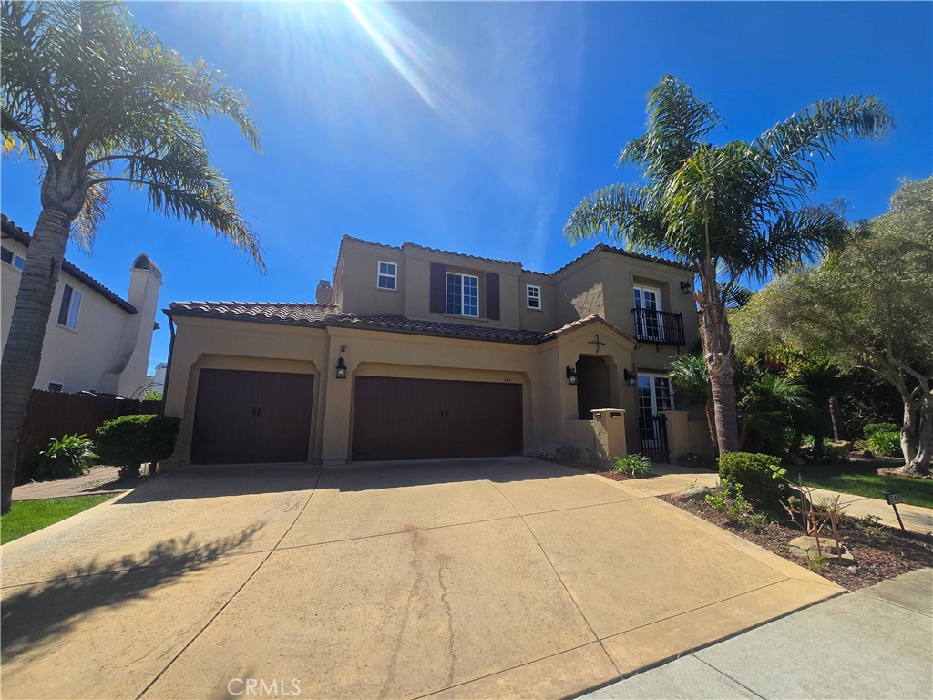 549 Palomar Circle Lompoc, CA 93436 - Photo 2 of 58 a front view of a house with a yard and garage