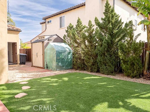 549 Palomar Circle Lompoc, CA 93436 - Photo 40 of 58 a backyard of a house with lots of green space