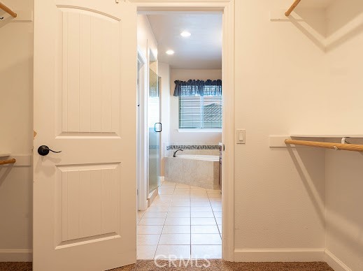 549 Palomar Circle Lompoc, CA 93436 - Photo 5 of 58 a bathroom with a glass shower door