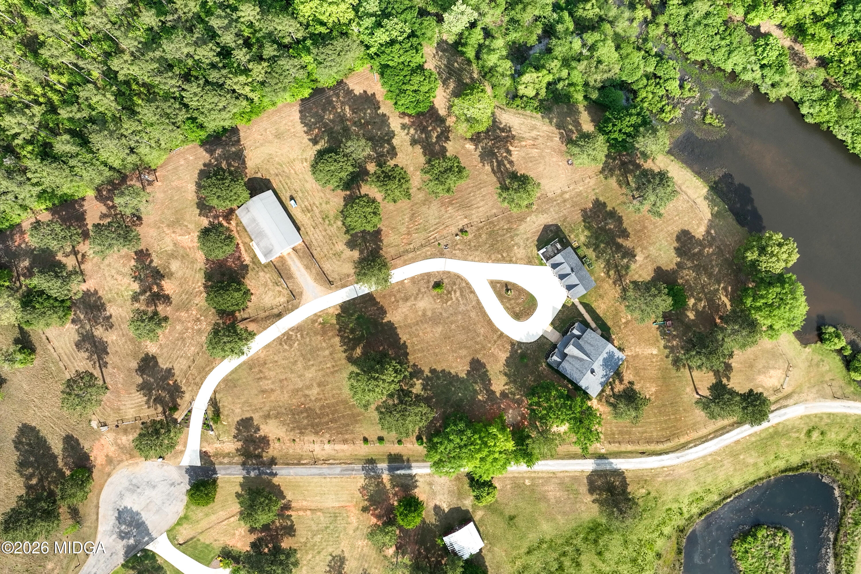 13 Southern Waters Way Forsyth, GA 31029 - Photo 112 of 112 an aerial view of a house with a yard