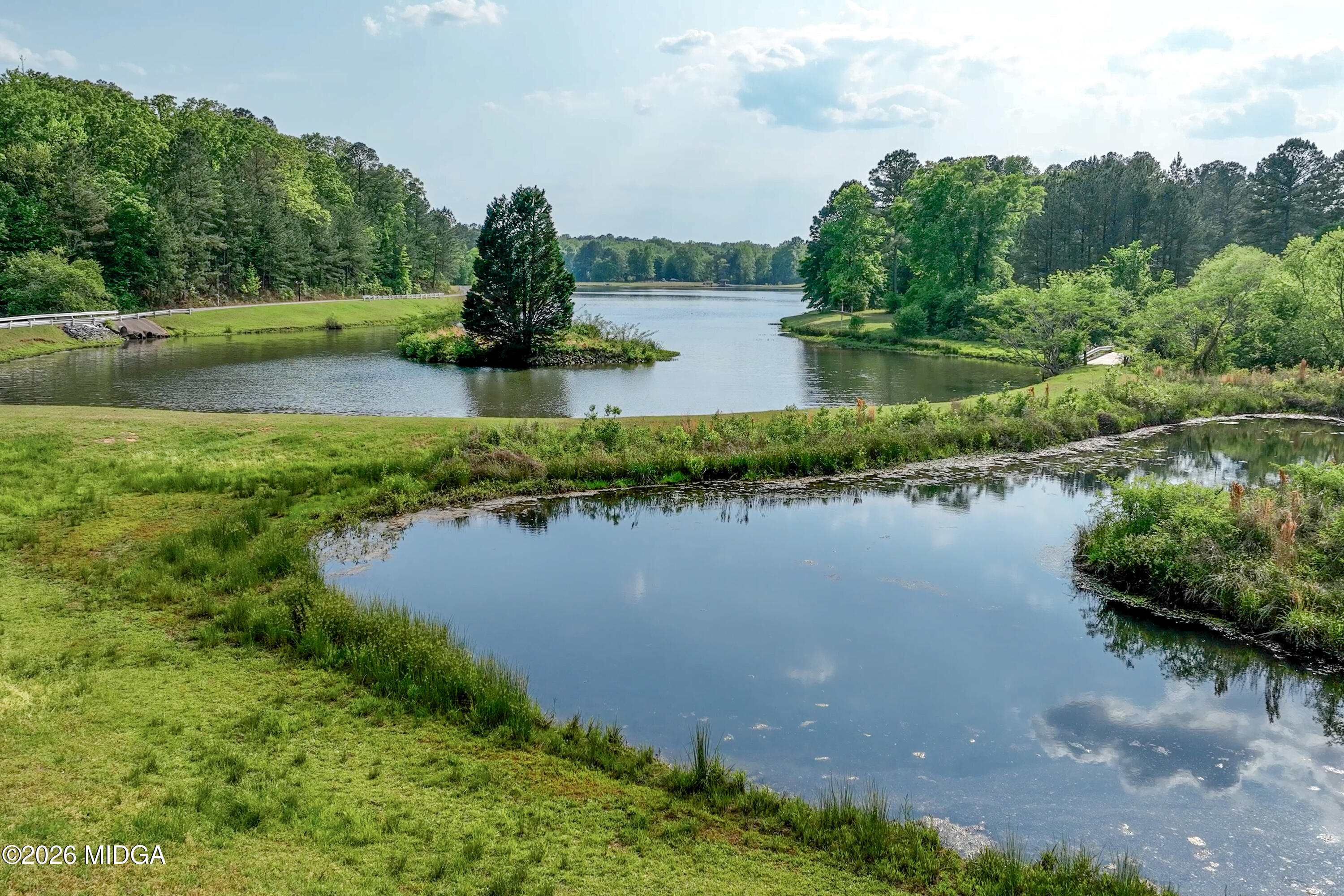 13 Southern Waters Way Forsyth, GA 31029 - Photo 6 of 112 a view of a lake view with houses in back