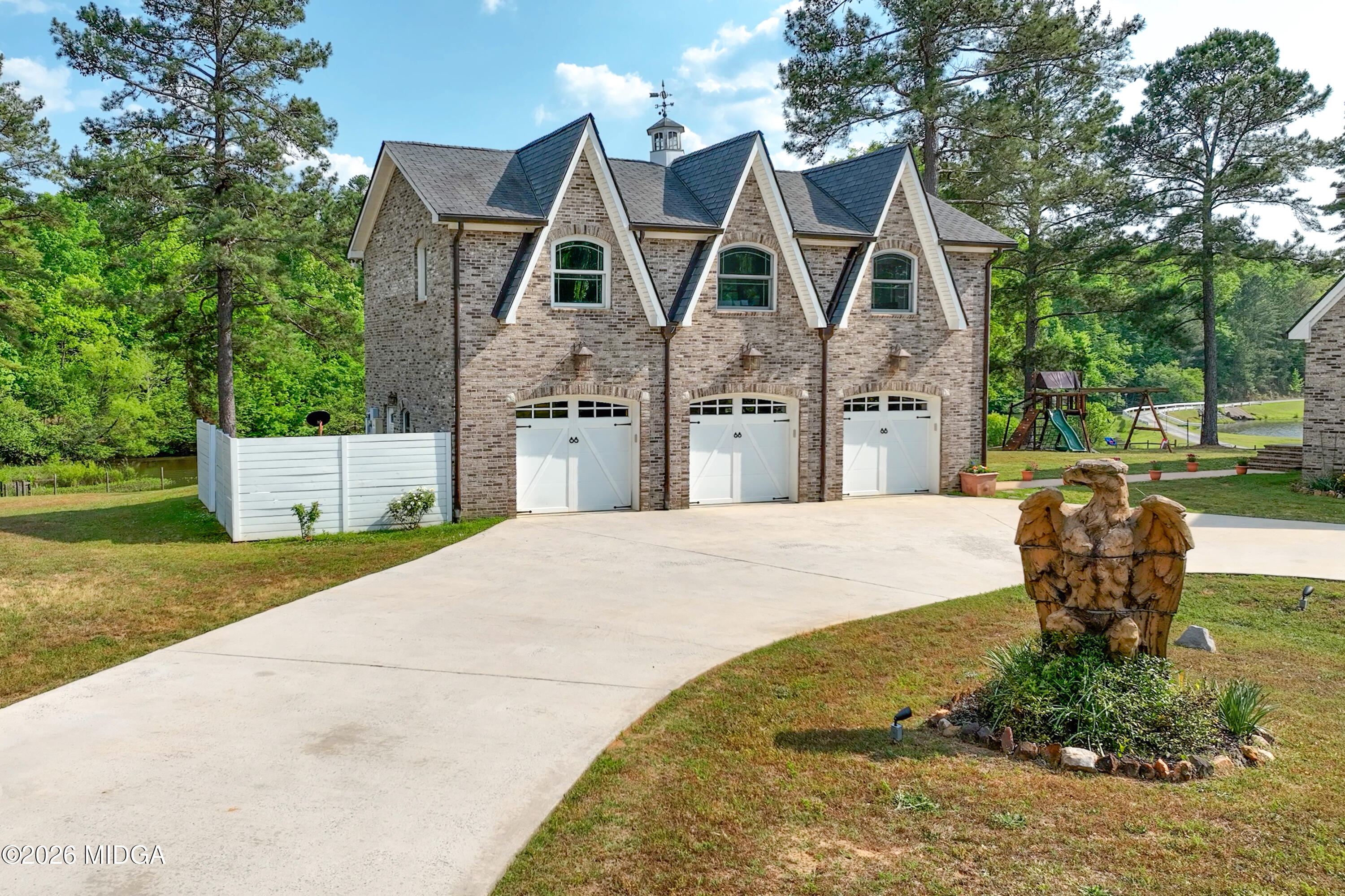 13 Southern Waters Way Forsyth, GA 31029 - Photo 65 of 112 a front view of a house with garden