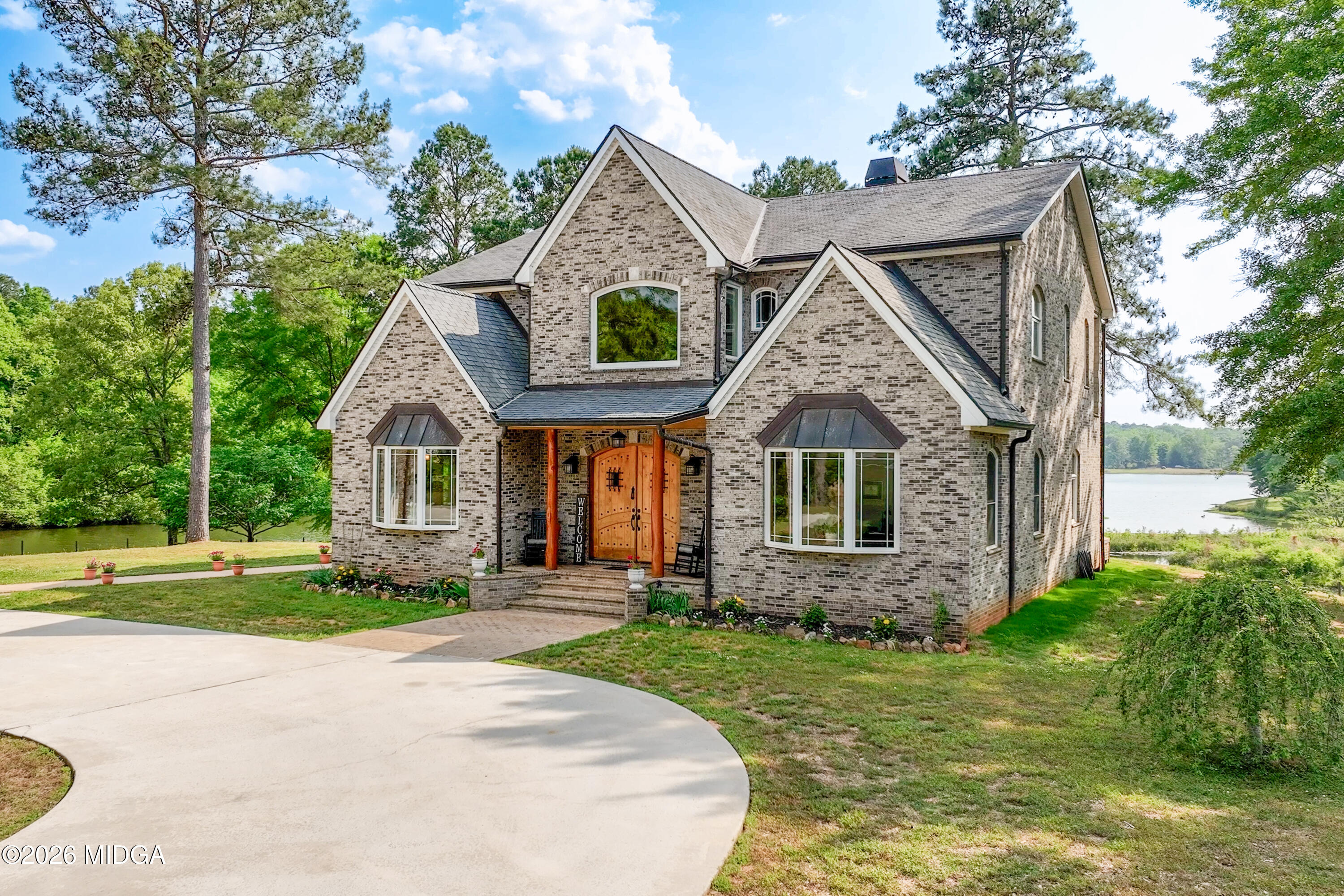 13 Southern Waters Way Forsyth, GA 31029 - Photo 7 of 112 a front view of a house with a yard