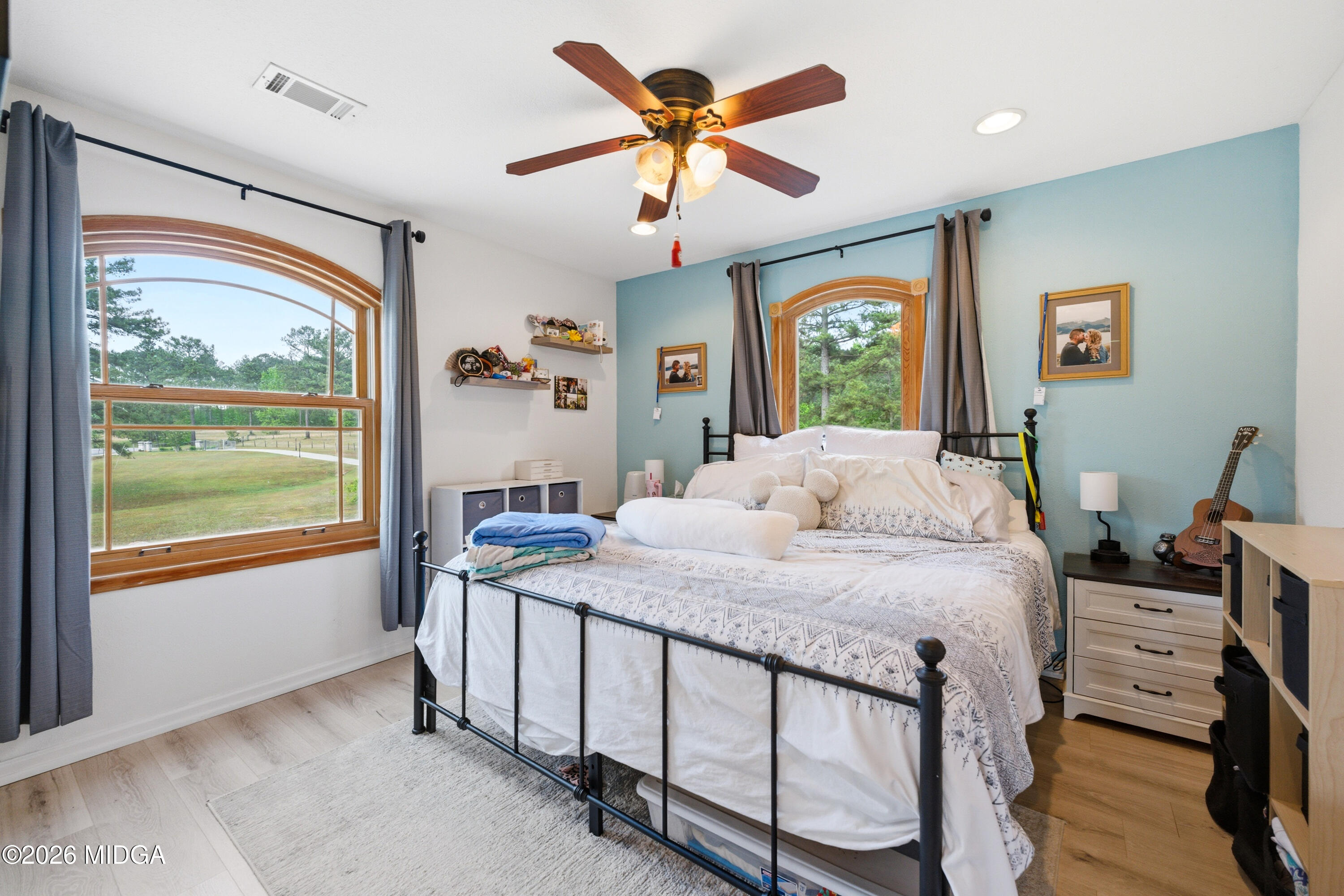 13 Southern Waters Way Forsyth, GA 31029 - Photo 76 of 112 a bedroom with a bed and a large window