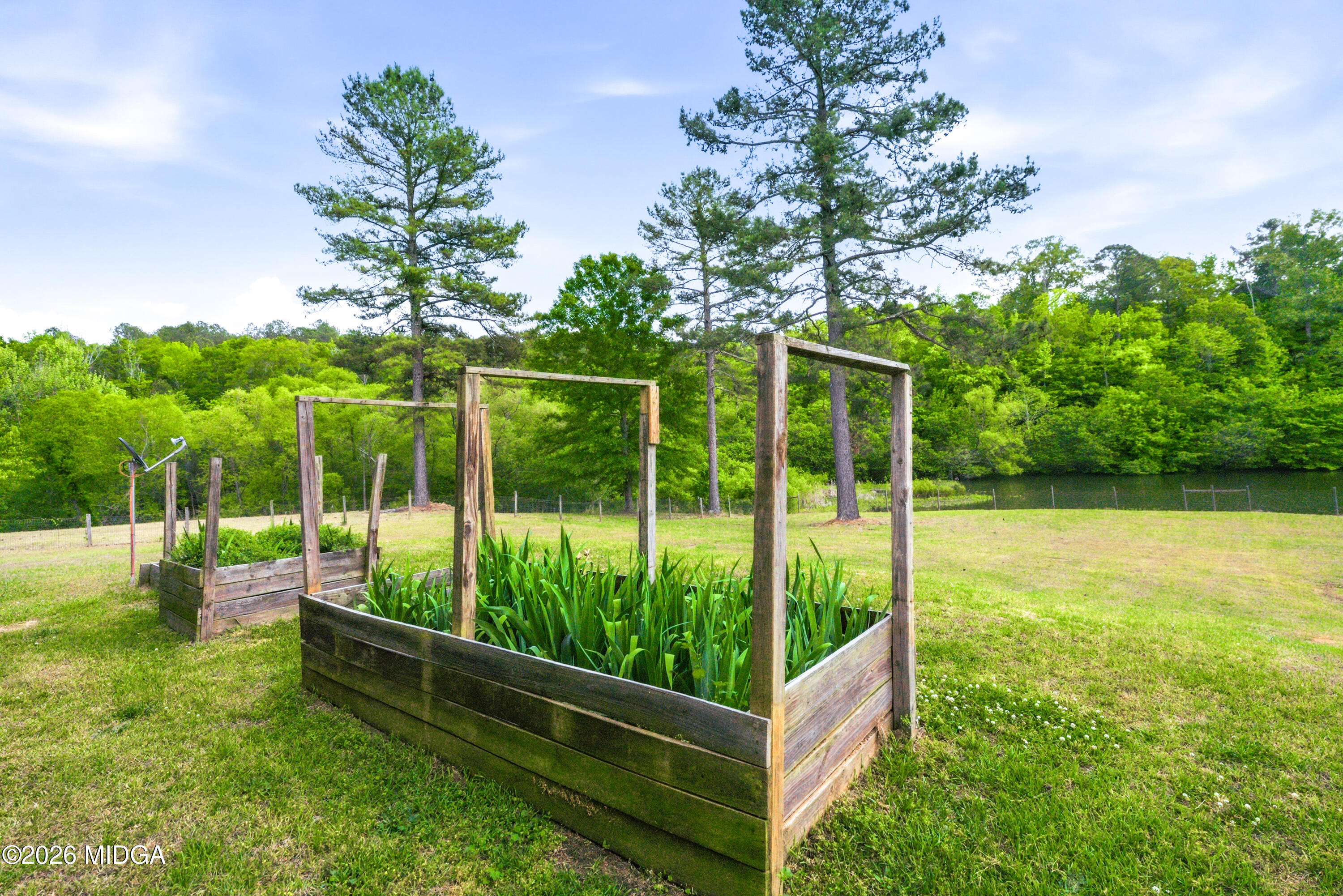 13 Southern Waters Way Forsyth, GA 31029 - Photo 88 of 112 a view of a backyard with a garden
