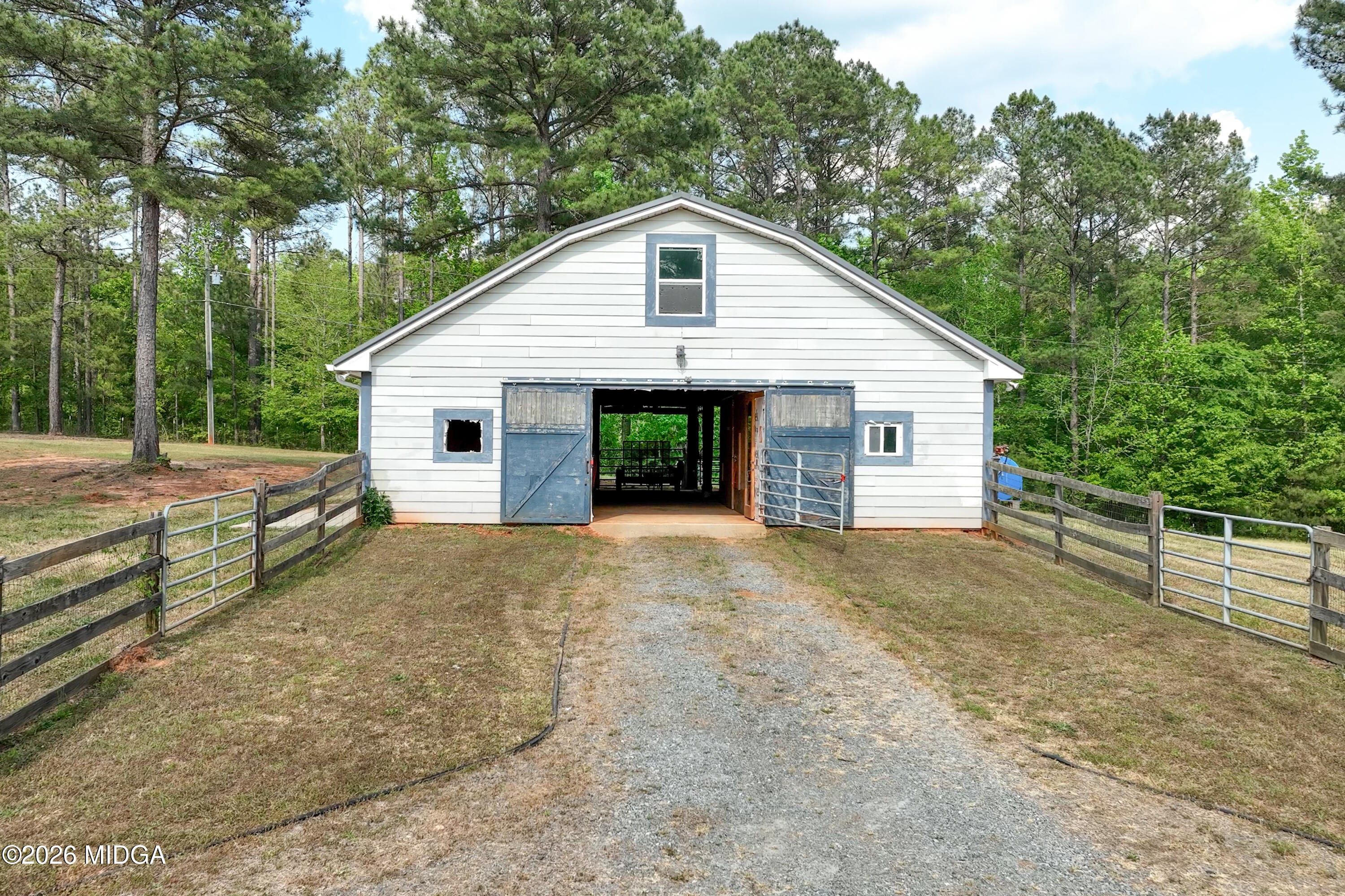 13 Southern Waters Way Forsyth, GA 31029 - Photo 100 of 112 a view of a house with a yard and large tree