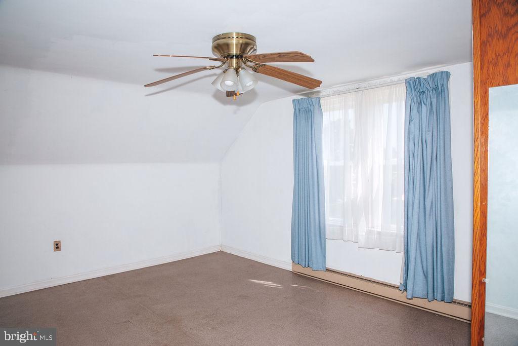 383 Elk Road Monroeville, NJ 08343 - Photo 12 of 25 a view of room with a ceiling fan