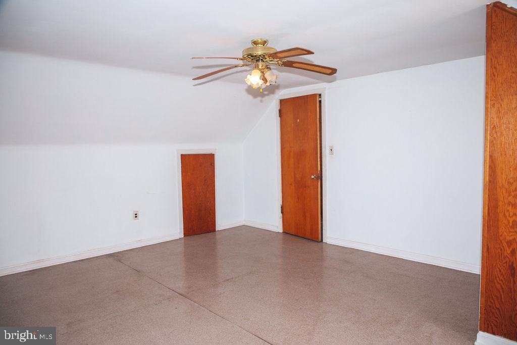 383 Elk Road Monroeville, NJ 08343 - Photo 15 of 25 a view of a room with a ceiling fan and window