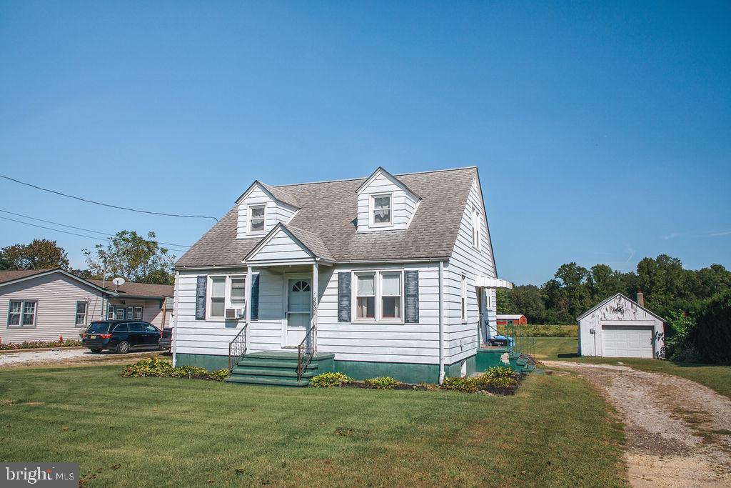 383 Elk Road Monroeville, NJ 08343 - Photo 25 of 25 a front view of a house with a garden