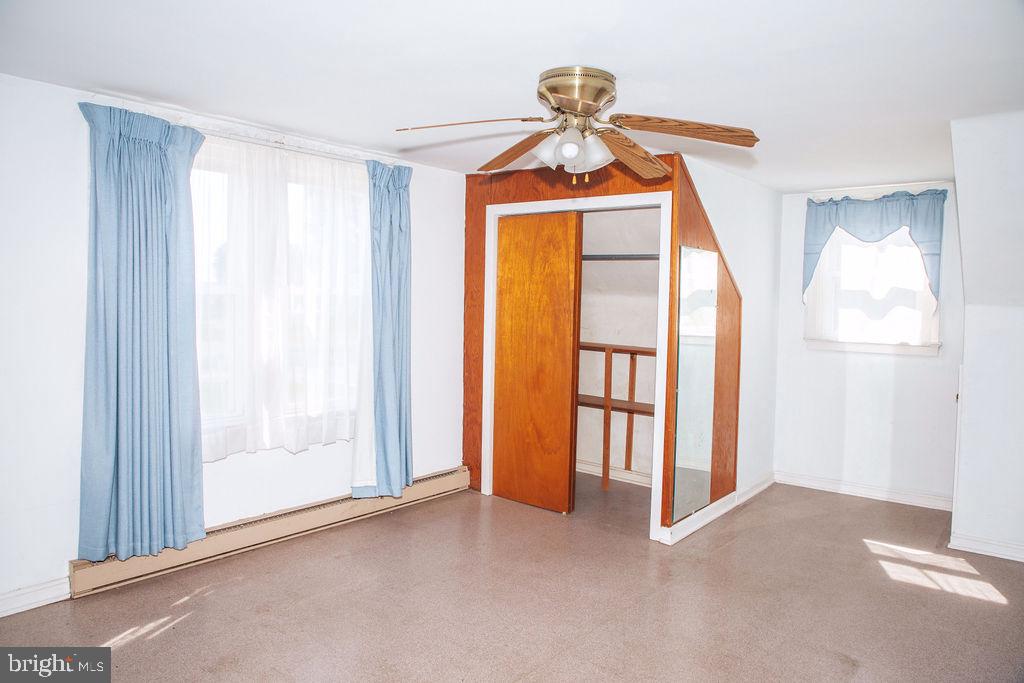 383 Elk Road Monroeville, NJ 08343 - Photo 10 of 25 a view of empty room and a window