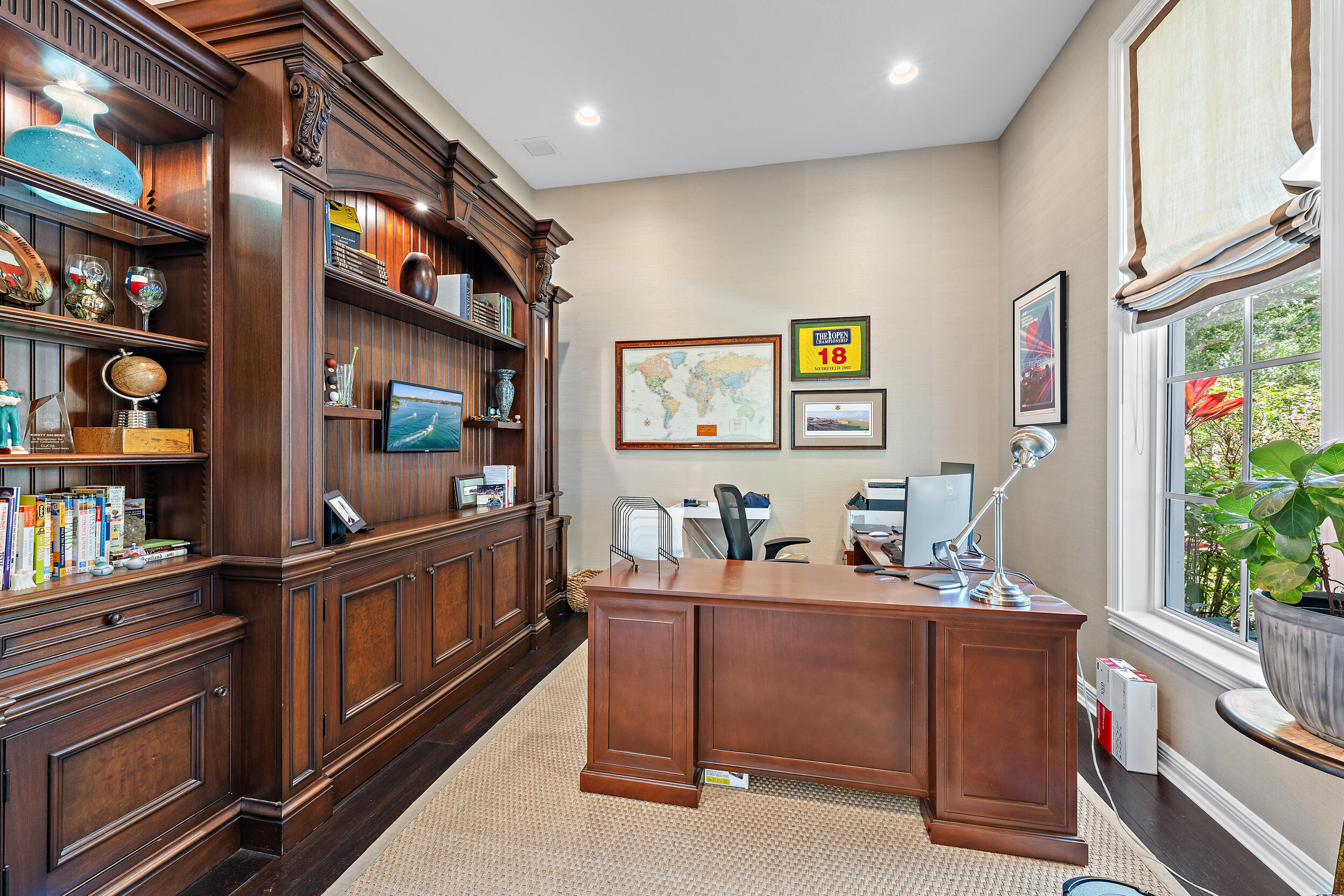 105 Segovia Way Jupiter, FL 33458 - Photo 20 of 33 a view of living room filled with furniture and book shelf