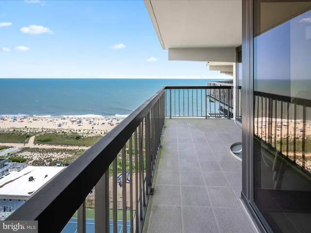 a view of a balcony with furniture