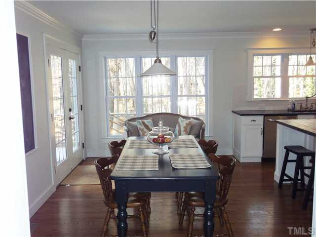 2020 Corberrie Lane Raleigh, NC 27613 - Photo 5 of 15 Breakfast area/eat-in kitchen. Doors to deck Breakfast Area