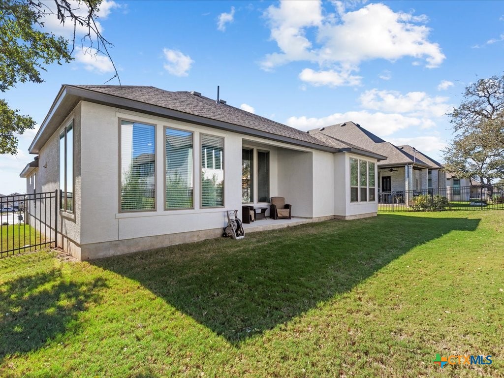 477 Vamanos Boerne, TX 78006 - Photo 28 of 29 a view of a house with backyard and porch