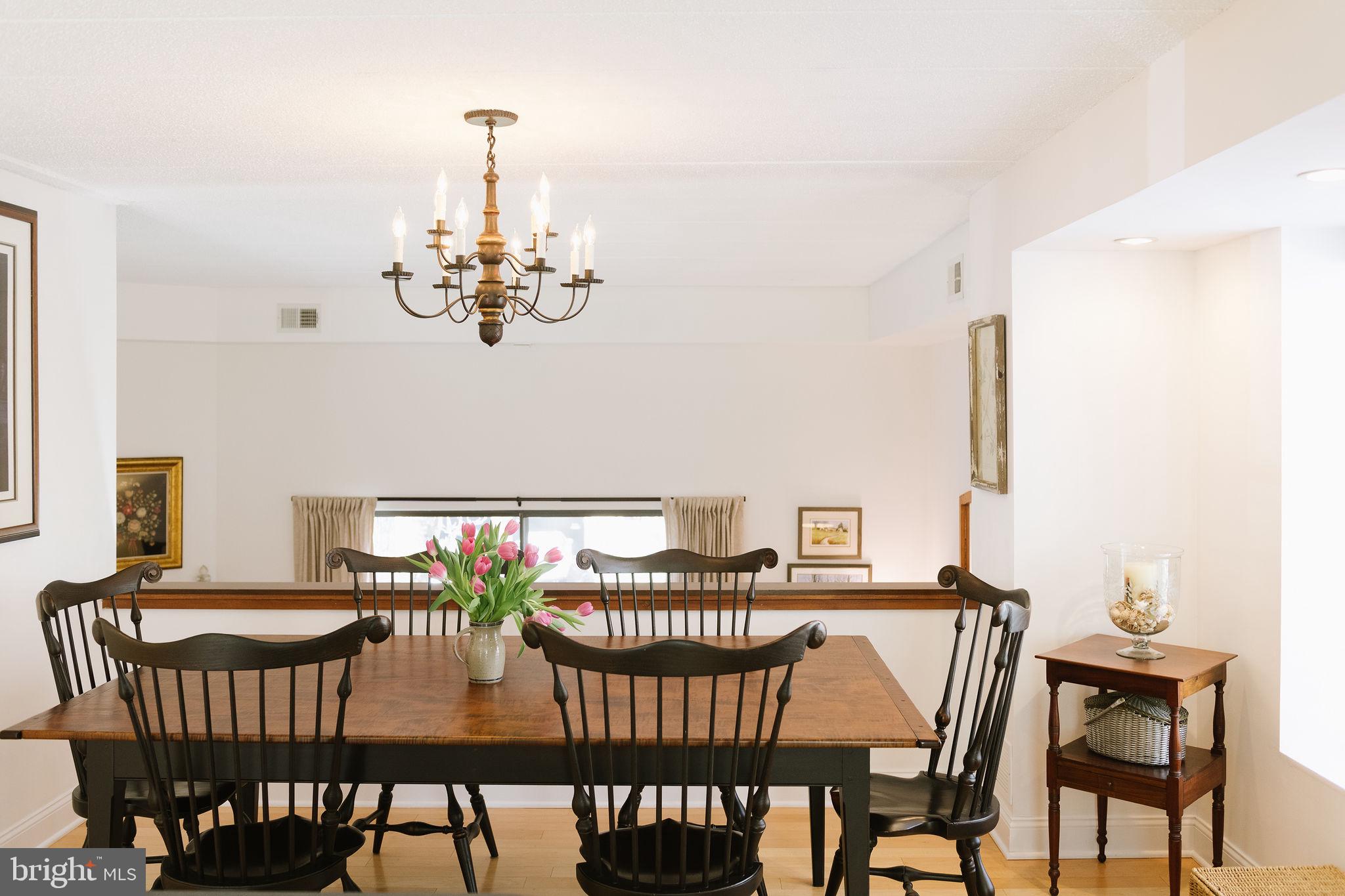532 North Lemon Street Media, PA 19063 - Photo 16 of 63 a view of a dining room with furniture wooden floor and a chandelier