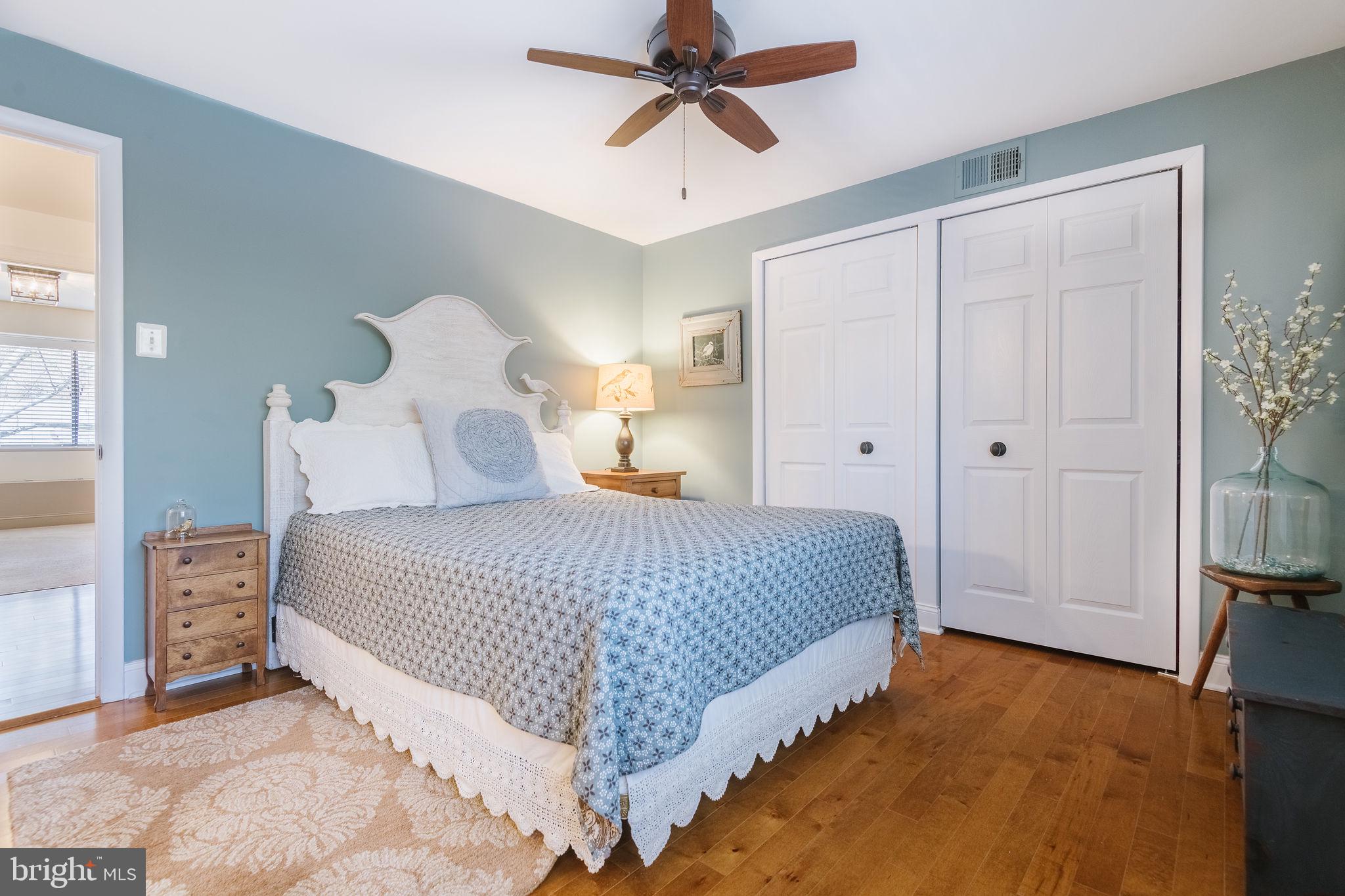 532 North Lemon Street Media, PA 19063 - Photo 39 of 63 a bedroom with a bed and a chandelier