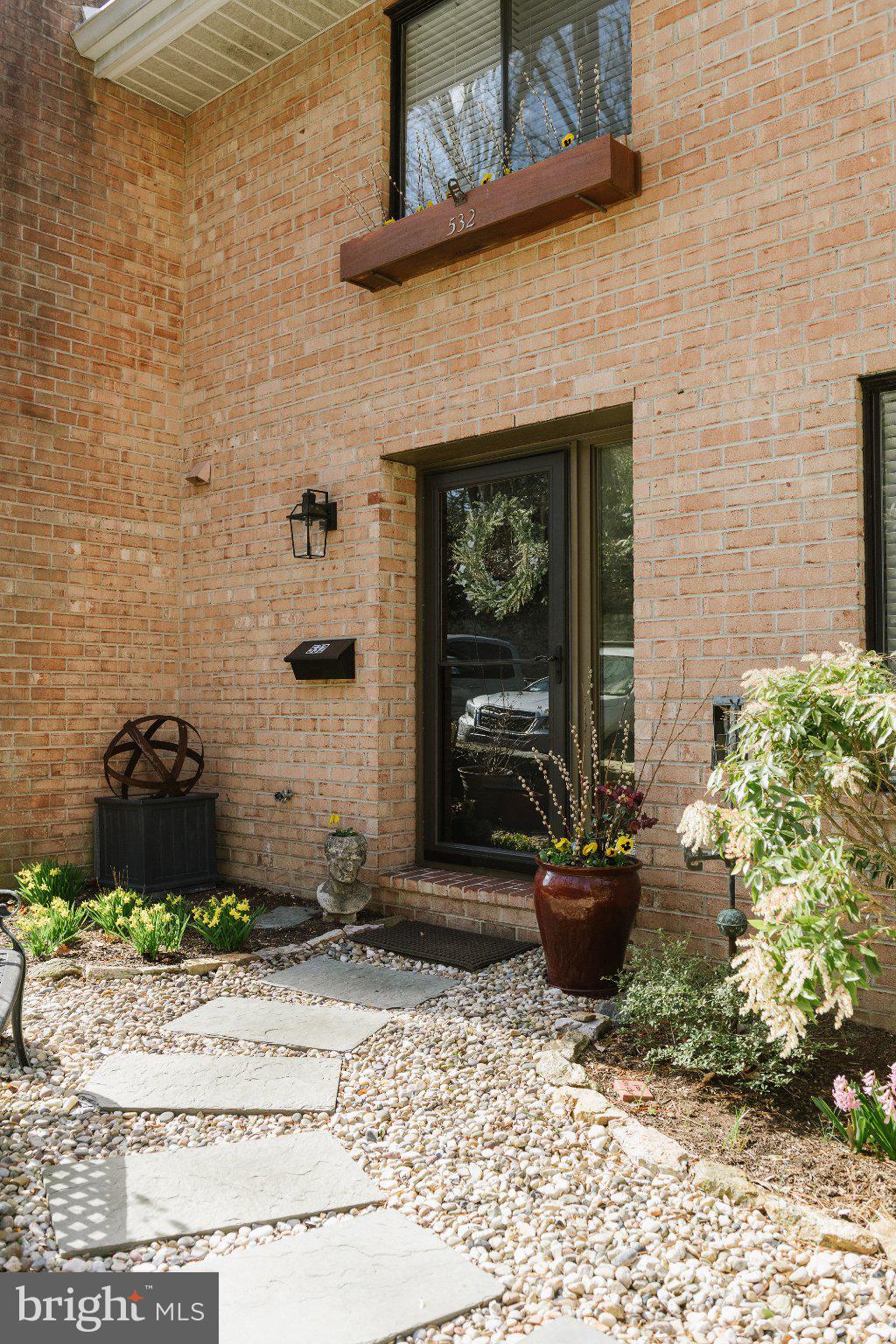 532 North Lemon Street Media, PA 19063 - Photo 62 of 63 a front view of a house with potted plants