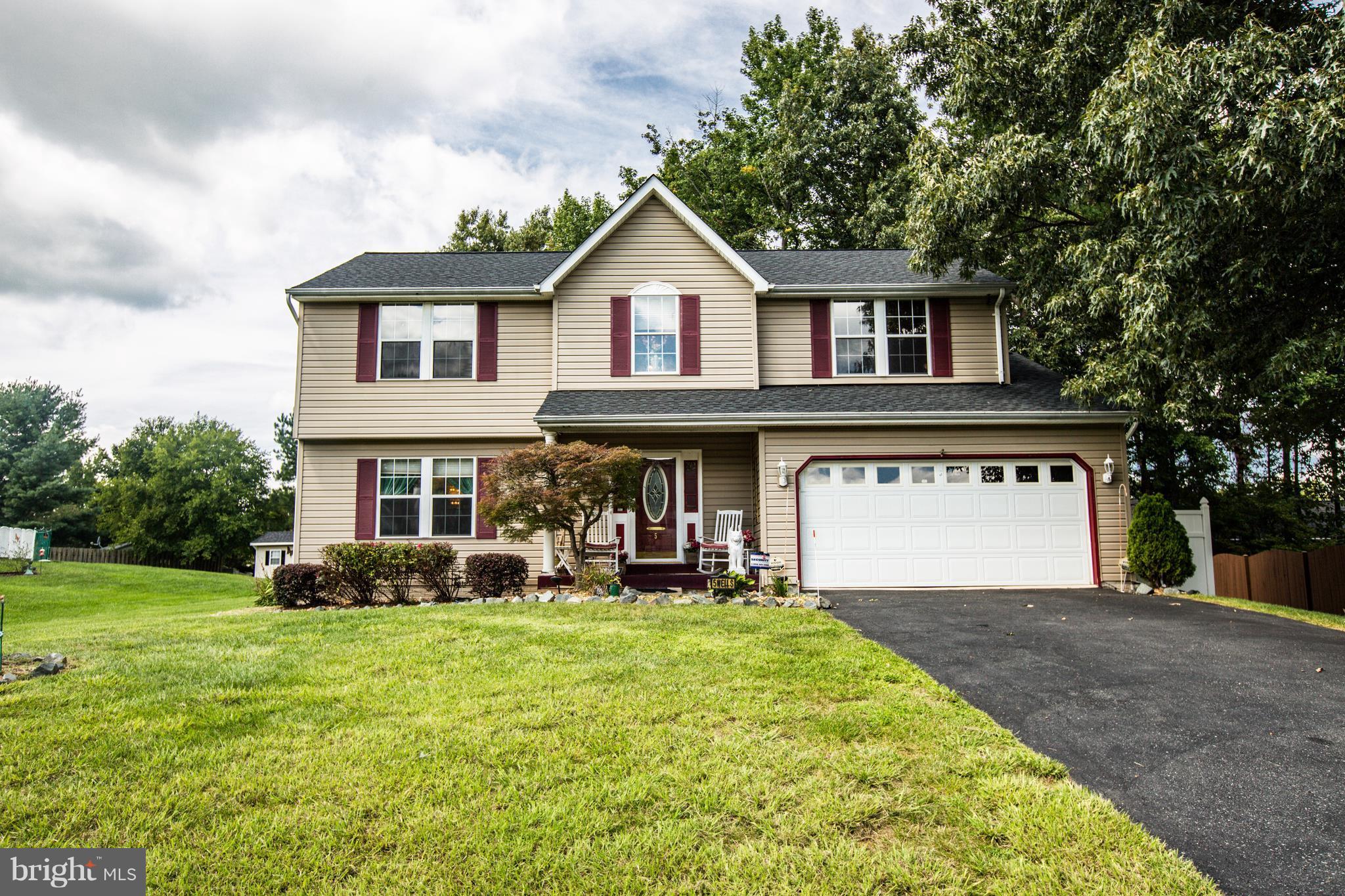 5 Wells Road Stafford, VA 22556 - Photo 1 of 28 a front view of a house with garden