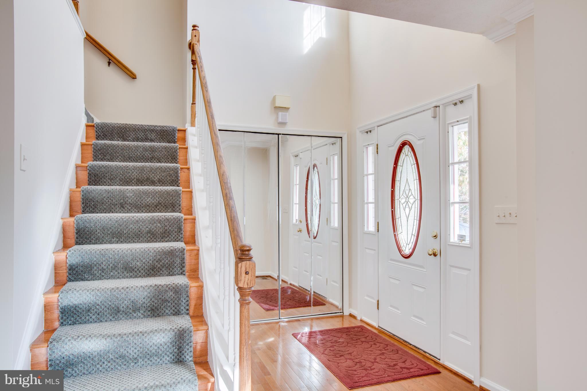 5 Wells Road Stafford, VA 22556 - Photo 2 of 28 a view of entryway with wooden floor and stairs