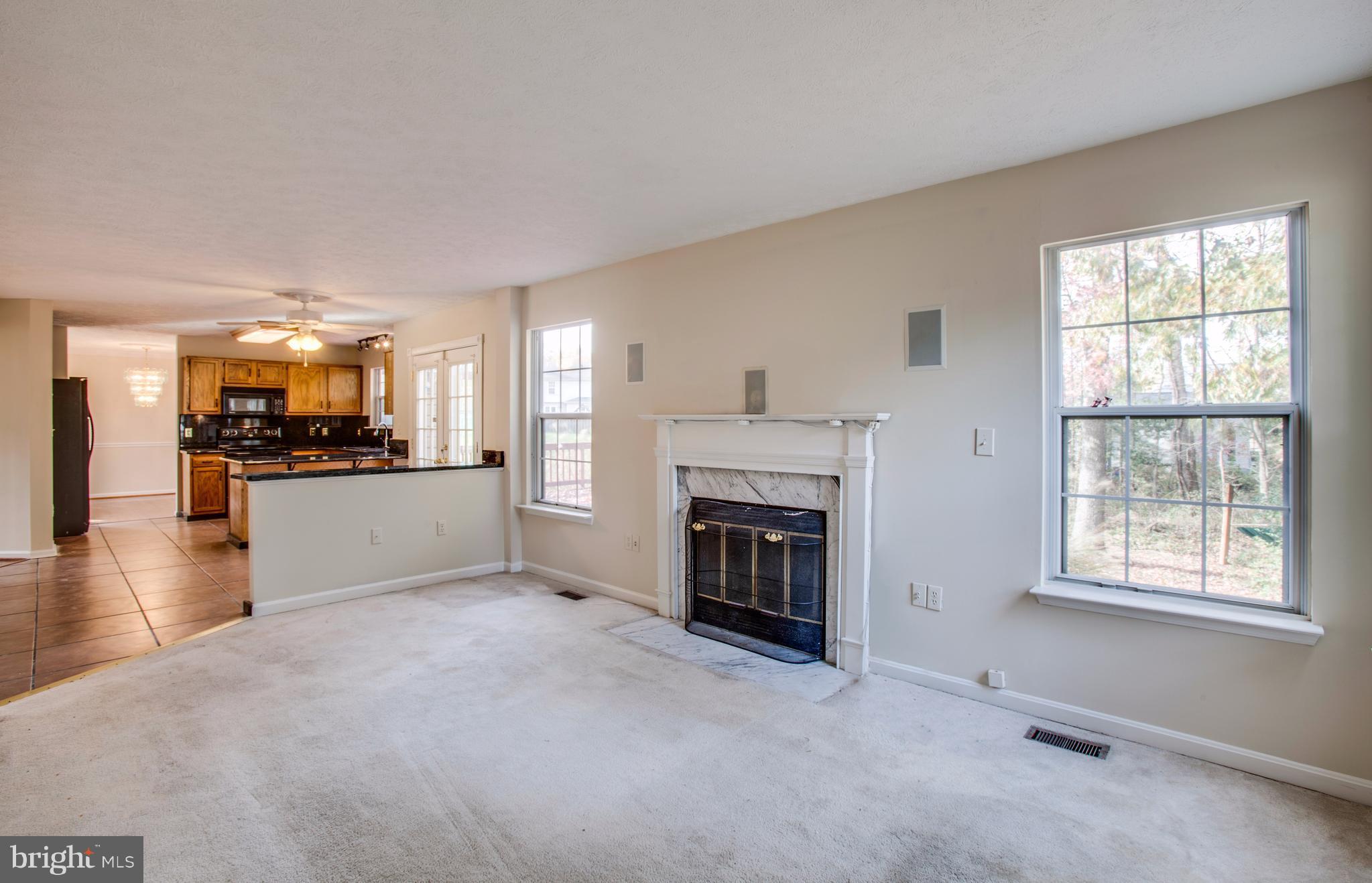 5 Wells Road Stafford, VA 22556 - Photo 11 of 28 a view of a livingroom with a fireplace