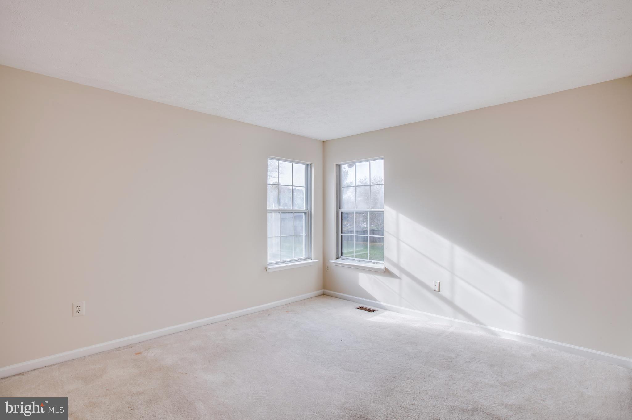 5 Wells Road Stafford, VA 22556 - Photo 14 of 28 an empty room with windows