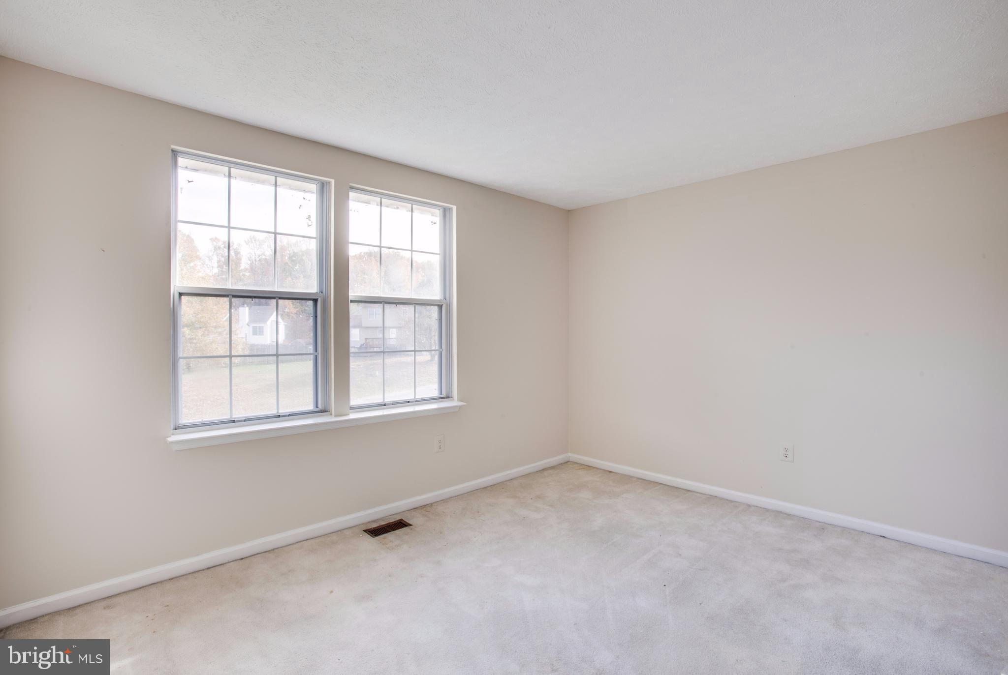 5 Wells Road Stafford, VA 22556 - Photo 16 of 28 an empty room with a window