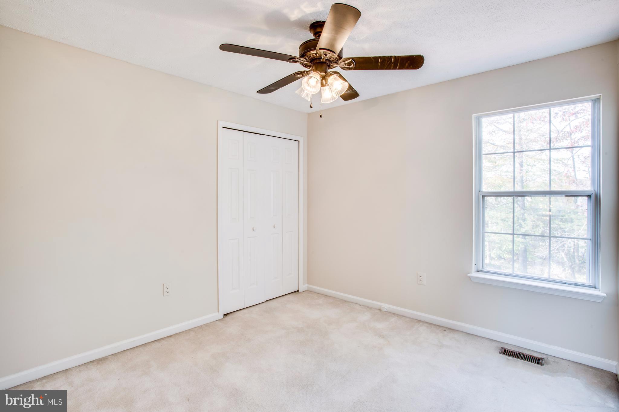 5 Wells Road Stafford, VA 22556 - Photo 17 of 28 an empty room with a window