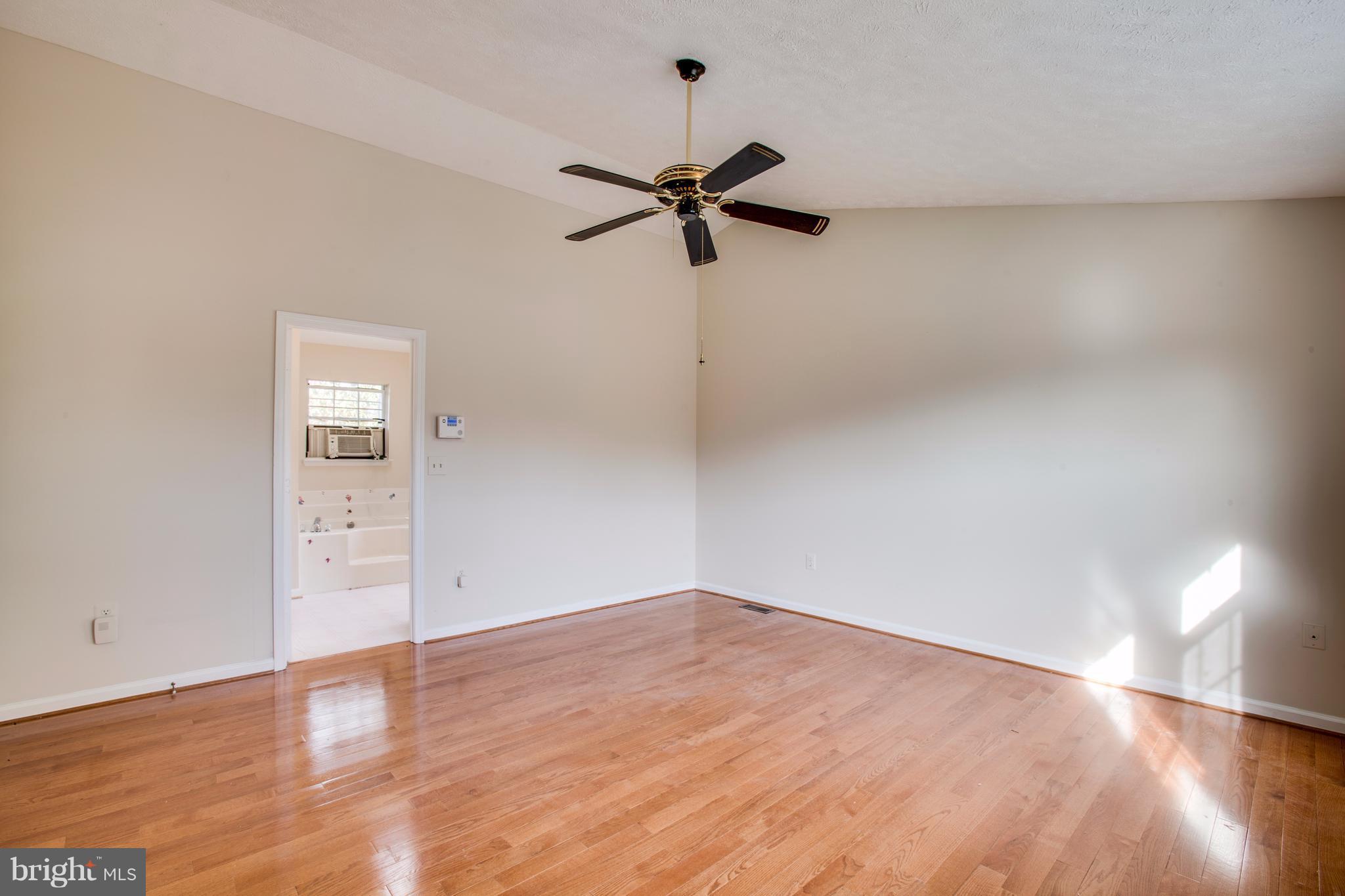 5 Wells Road Stafford, VA 22556 - Photo 19 of 28 a view of empty room with wooden floor