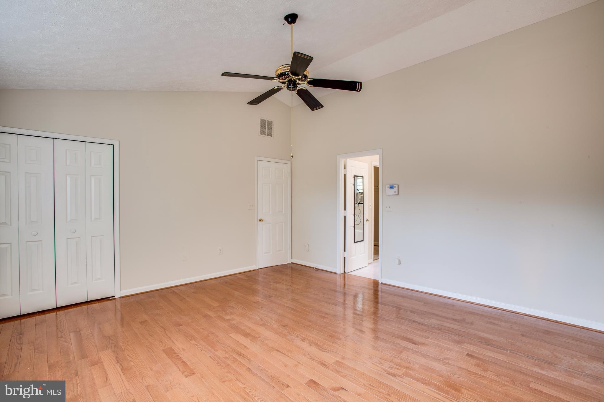 5 Wells Road Stafford, VA 22556 - Photo 20 of 28 a view of empty room with wooden floor