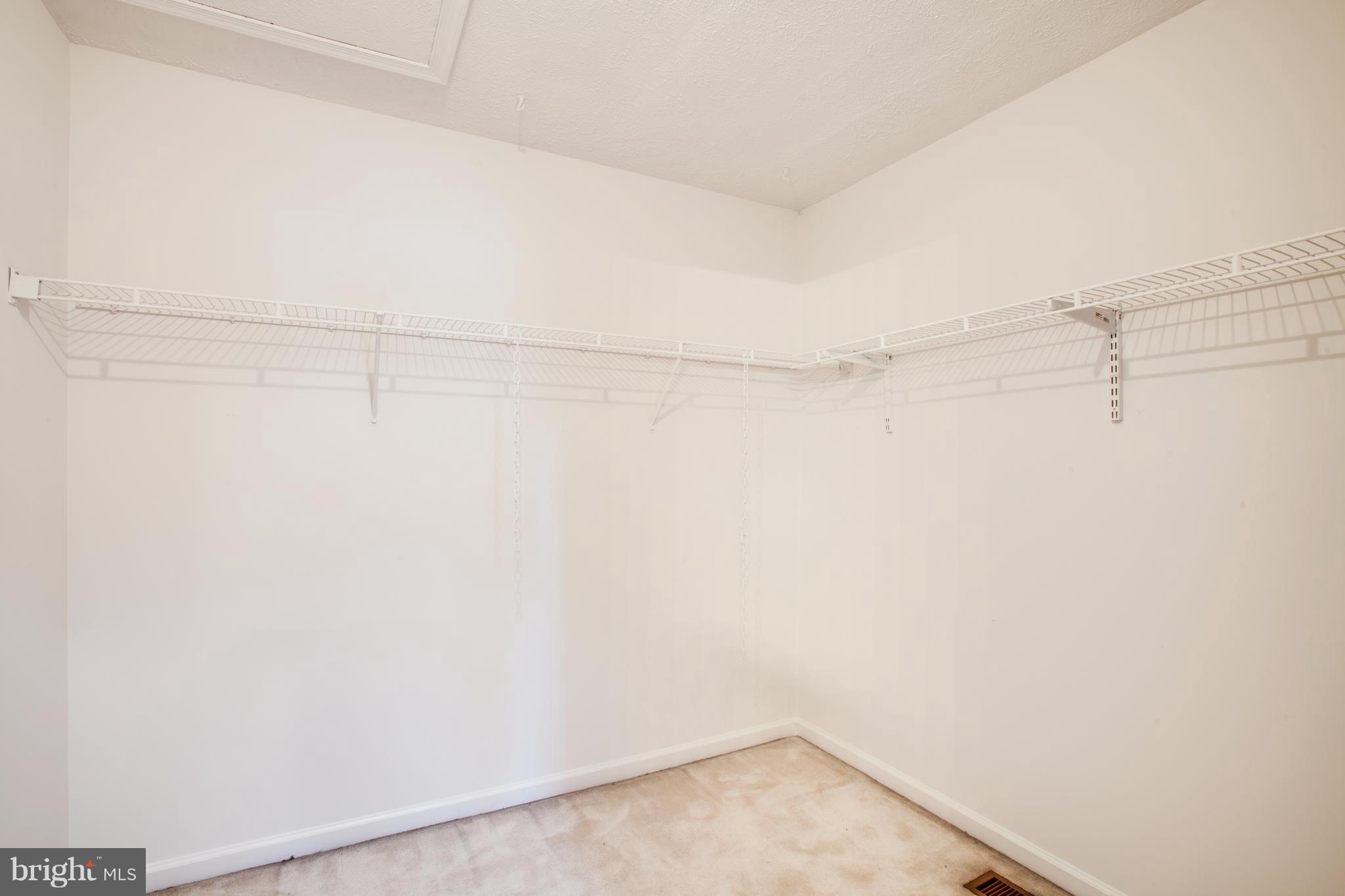 5 Wells Road Stafford, VA 22556 - Photo 22 of 28 a view of a room with racks on the wall