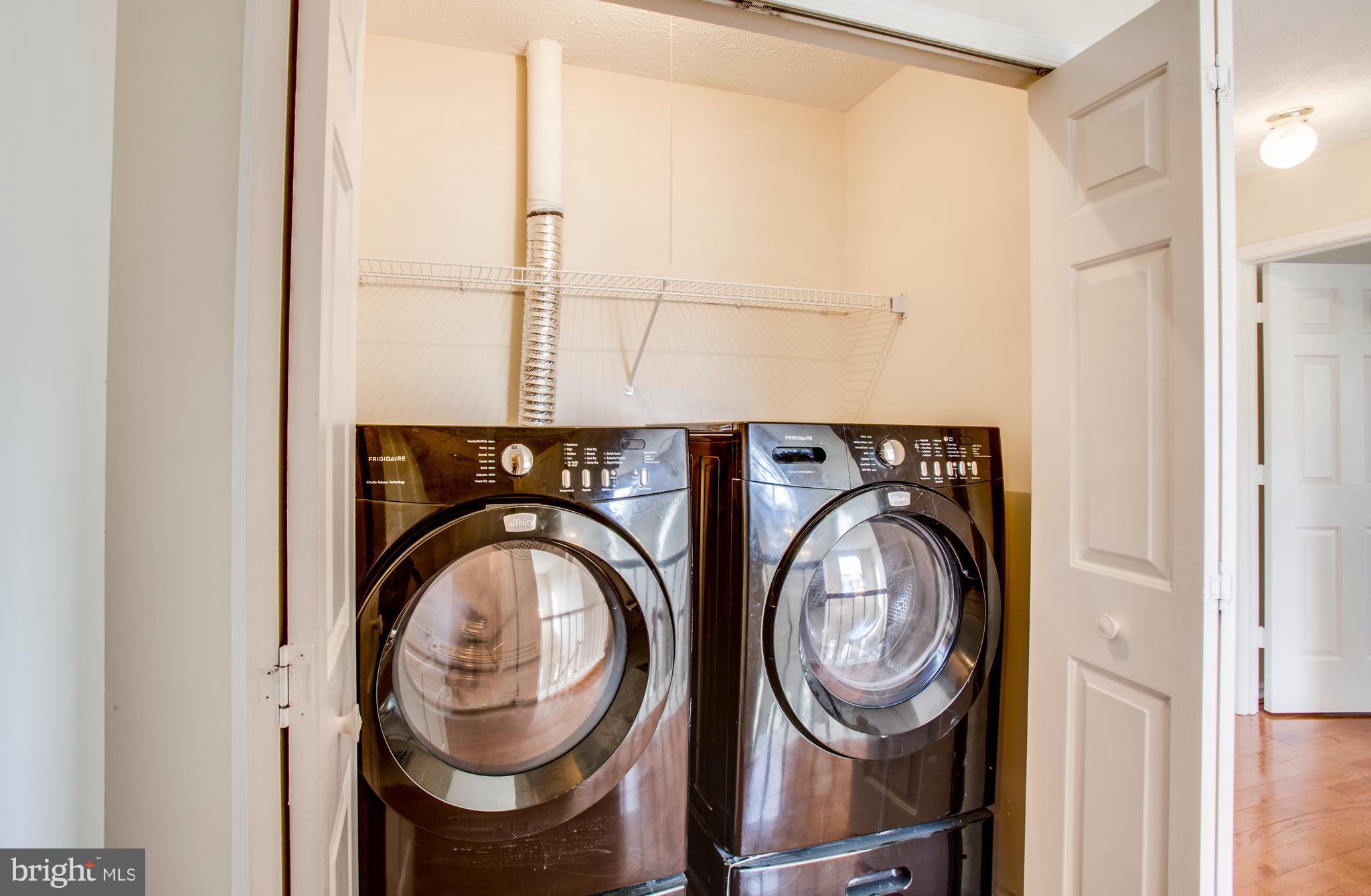 5 Wells Road Stafford, VA 22556 - Photo 24 of 28 a view of washer and dryer in a utility room