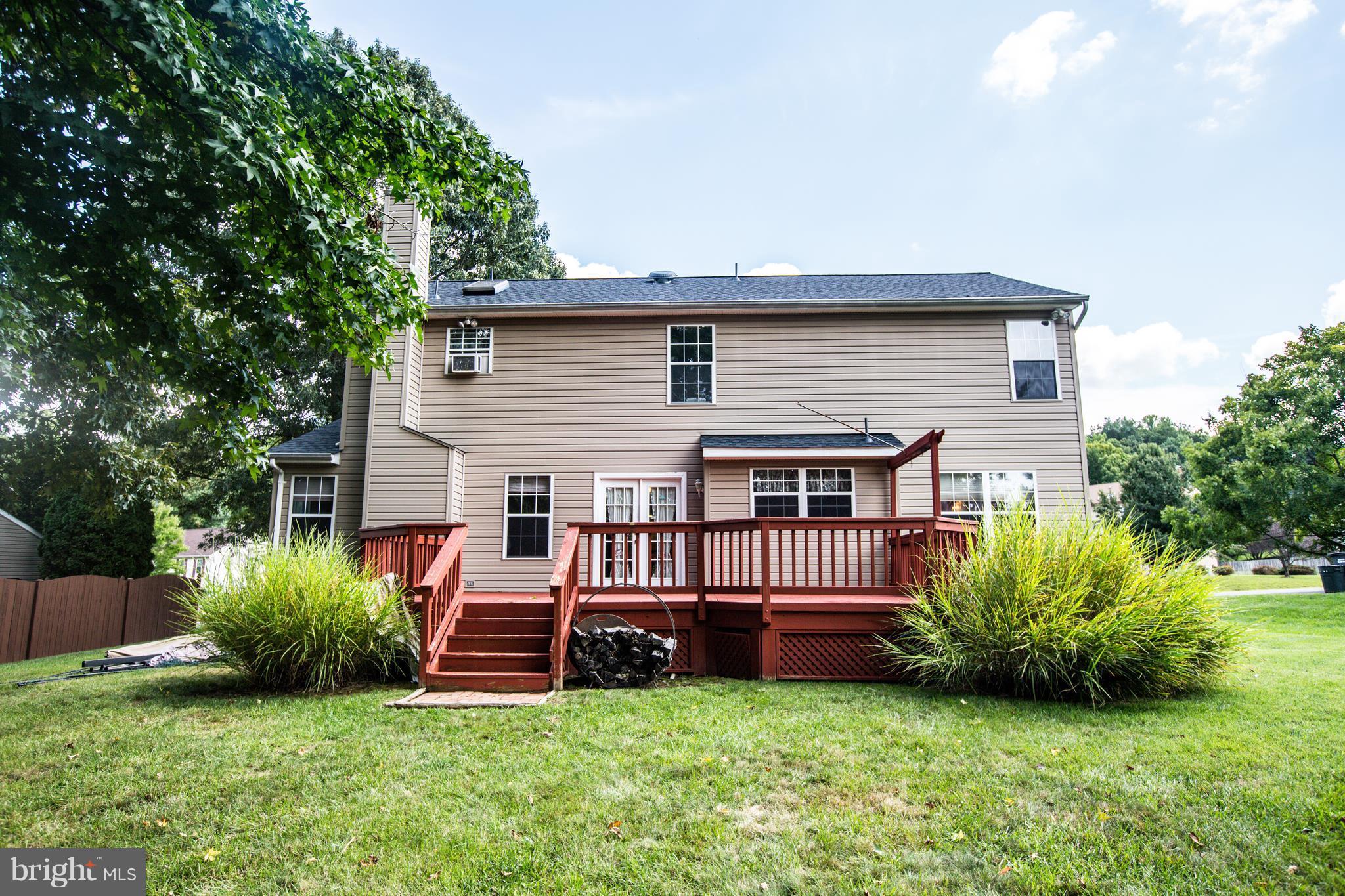 5 Wells Road Stafford, VA 22556 - Photo 27 of 28 a view of a house with a yard and sitting area