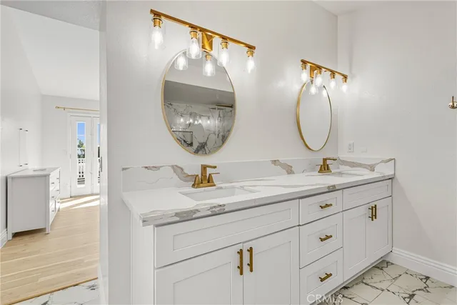 a bathroom with a sink and a shower