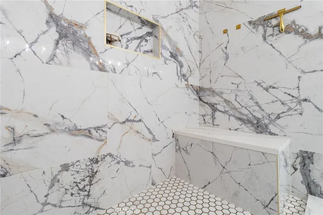 a view of a balcony with wooden fence