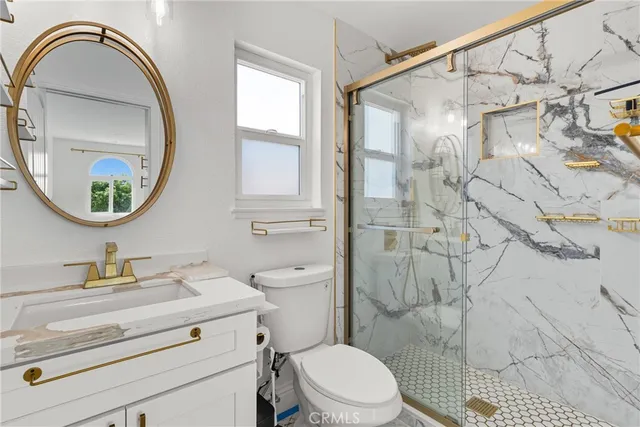 a view of a house with a backyard porch and sitting area
