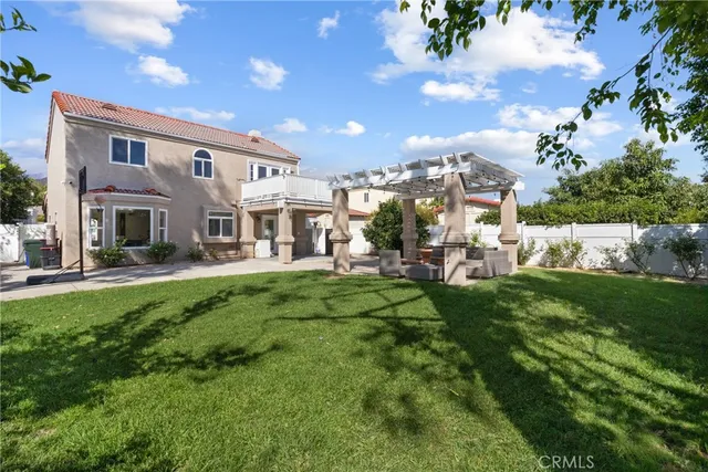 an aerial view of a house with lake view