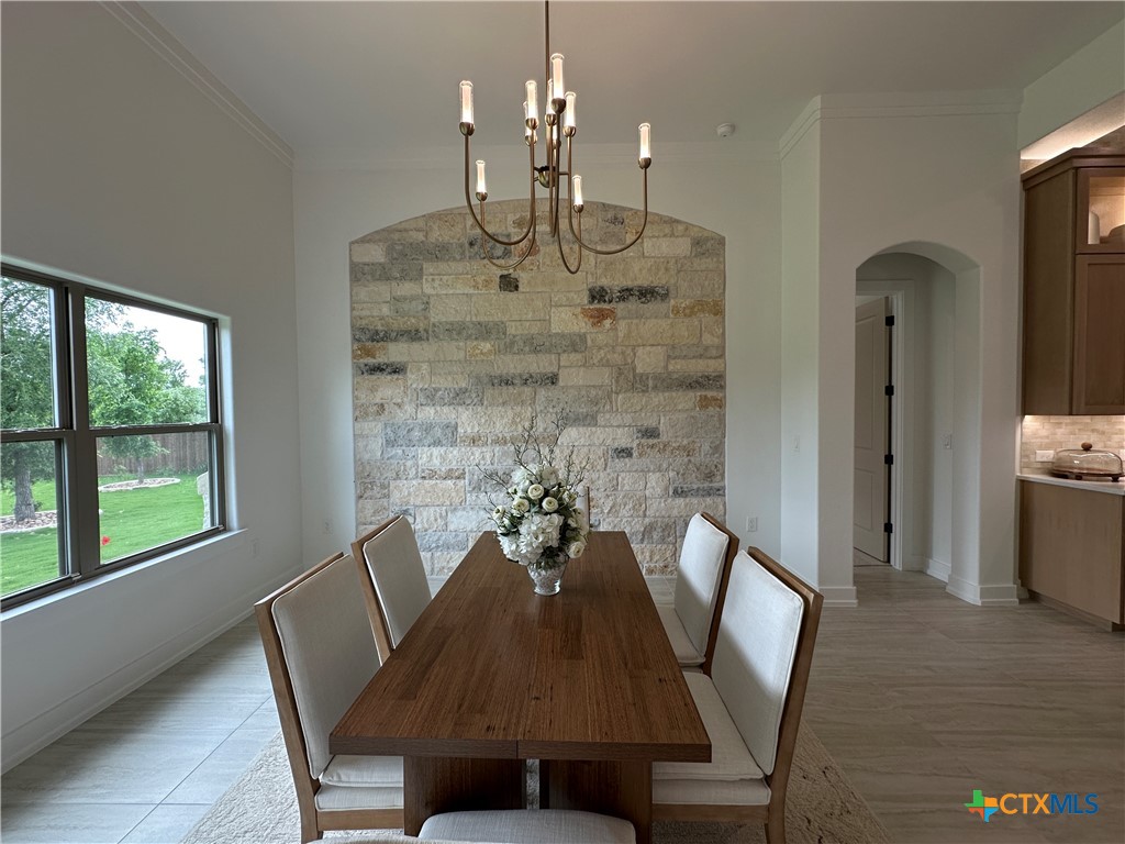 430 Dos Rios Drive Belton, TX 76513 - Photo 14 of 48 a view of a dining room with furniture and wooden floor