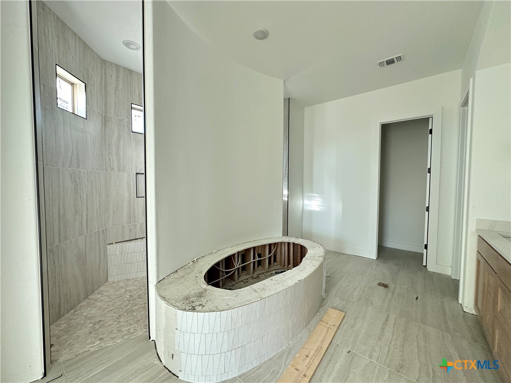430 Dos Rios Drive Belton, TX 76513 - Photo 20 of 29 a kitchen with a sink and a refrigerator
