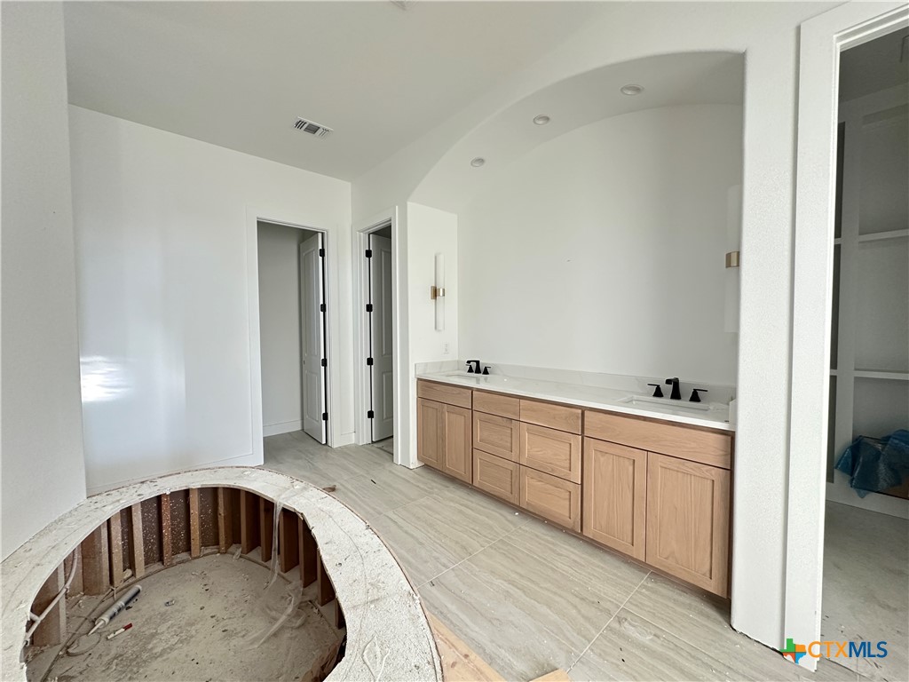 430 Dos Rios Drive Belton, TX 76513 - Photo 24 of 29 a bathroom with a sink and mirror