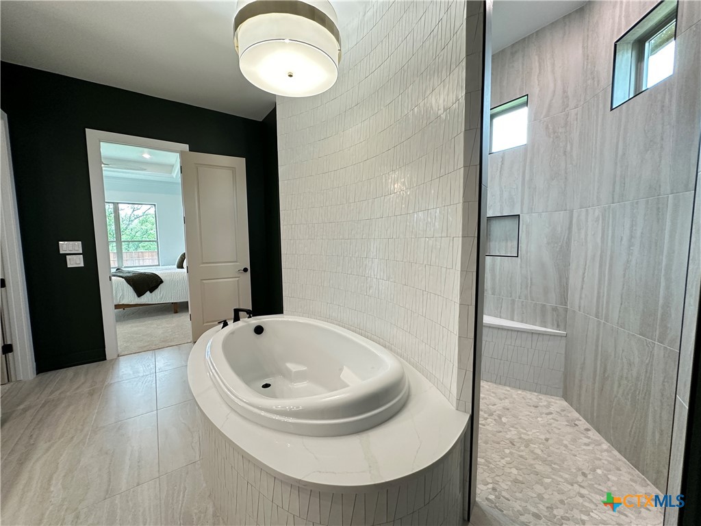 430 Dos Rios Drive Belton, TX 76513 - Photo 40 of 48 a bathroom with a sink and a mirror