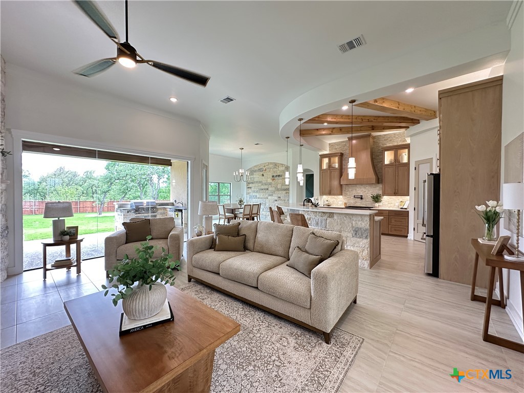 430 Dos Rios Drive Belton, TX 76513 - Photo 5 of 48 a living room with furniture kitchen view and large windows