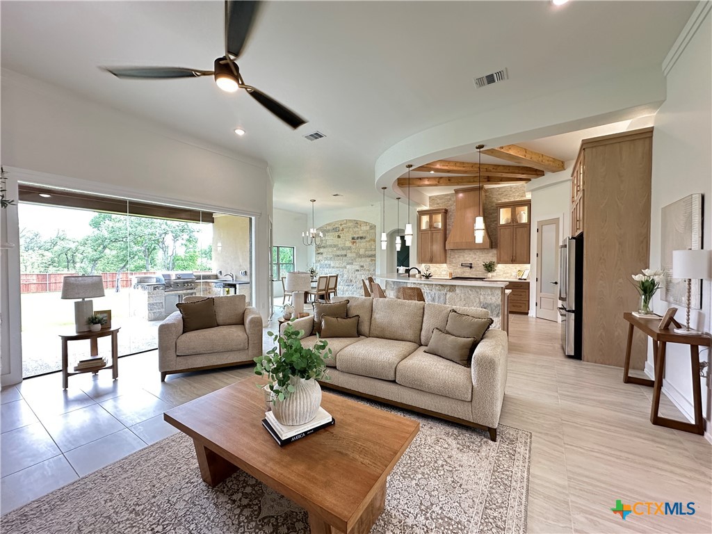 430 Dos Rios Drive Belton, TX 76513 - Photo 6 of 48 a living room with furniture wooden floor and a large window