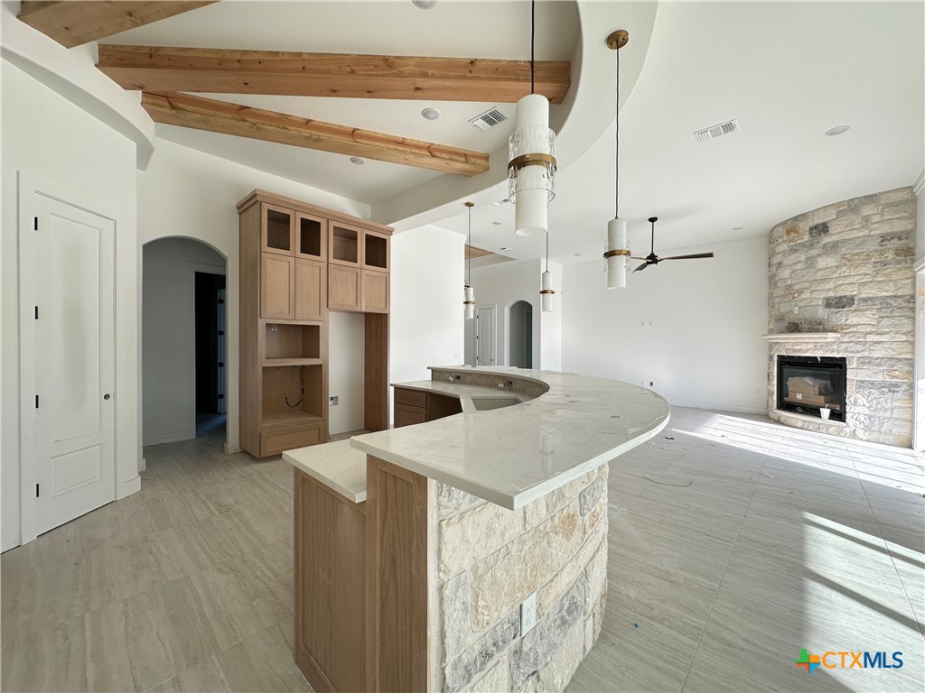 430 Dos Rios Drive Belton, TX 76513 - Photo 6 of 29 a open kitchen with a sink a refrigerator and a stove
