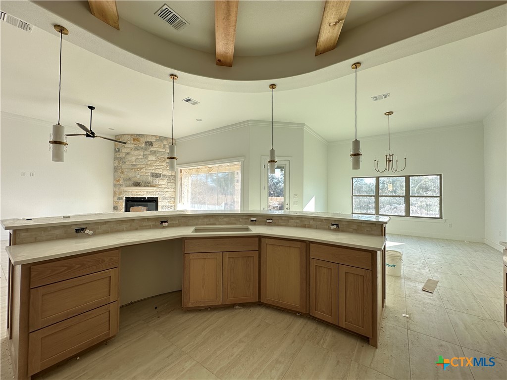 430 Dos Rios Drive Belton, TX 76513 - Photo 7 of 29 a large kitchen with a sink and cabinets